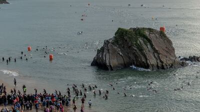 Competitors during the swimming portion of the Wales Ironman in Tenby.