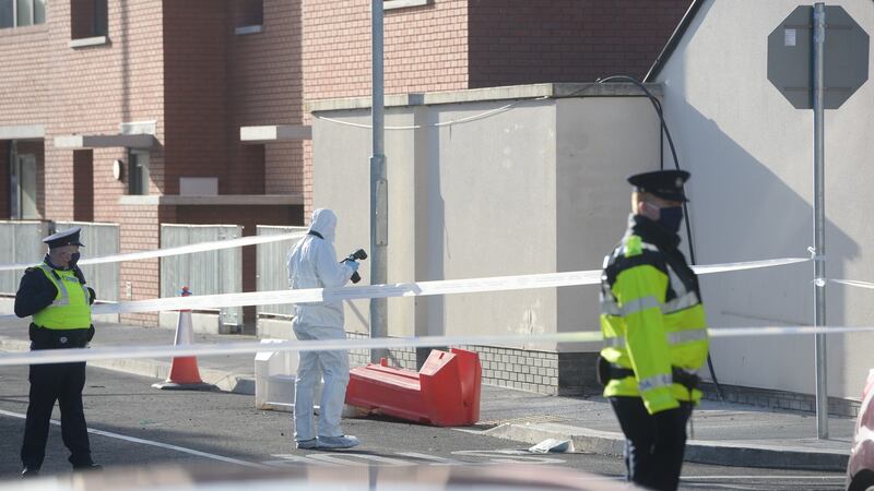 The scene of the shooting was sealed off on Wednesday night with gardaí keeping it secure ahead of a forensic examination on Thursday morning. Photograph: Dara Mac Donaill