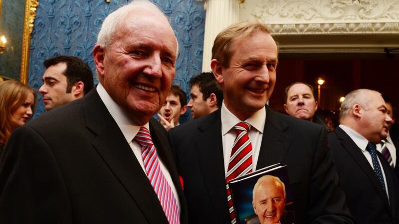 Bill O’Herlihy pictured at the  launch of his autobiography “We’ll leave it there so” in 2012, with Taoiseach Enda Kenny. Photograph: Bryan O’Brien/The Irish Times.