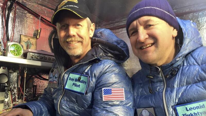 Pilots Troy Bradley and Leonid Tiukhtayev sit in the capsule of the Two Eagles balloon before setting off on their attempt to cross the Pacific by balloon and set a new distance and duration record. Photograph: Tamara Bradley/Two Eagles Balloon Team/Reuters