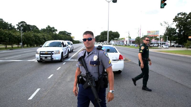 Police officers block a road after police officers were shot in Baton Rouge on Sunday. Photograph: Joe Penney/Reuters