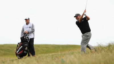 Darren Clarke hits his approach shot on the 7th hole during the final round in 2011. Photo: Andrew Redington/Getty Images