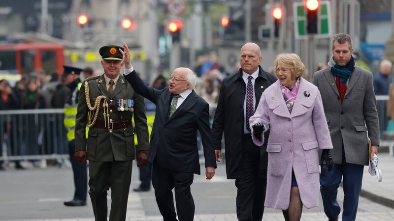 The President and his wife, Sabina, wave to the crowds after the 106th commemoration of the 1916 Easter Rising at Dublin’s GPO. Photograph: Alan Betson