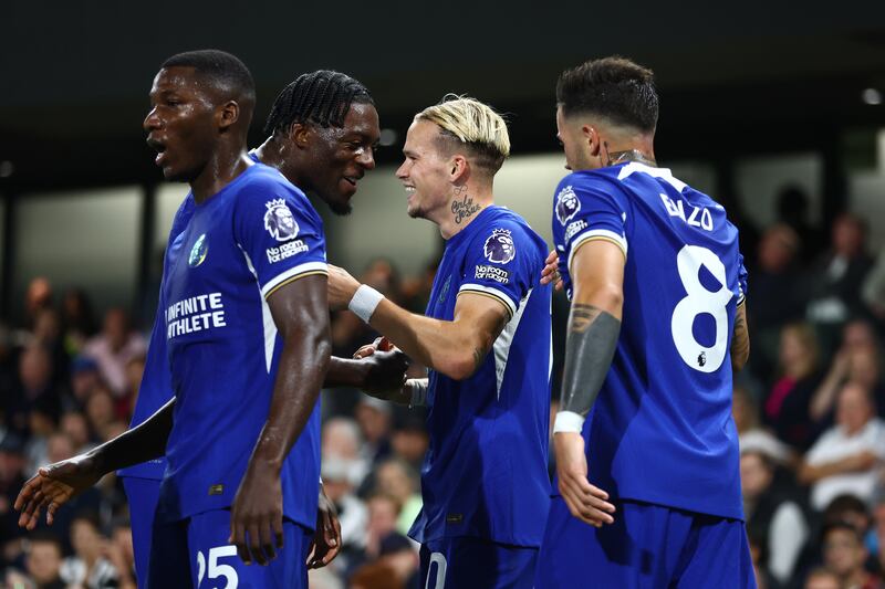 Chelsea's Mykhaylo Mudryk celebrates with teammate Axel Disasi after scoring the team's first goal against Fulham at Craven Cottage. Photograph: Bryn Lennon/Getty Images