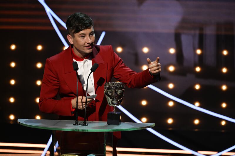 Barry Keoghan in a scarlet suit by Alexander McQueen. Photograph: Stuart Wilson/BAFTA/Getty Images