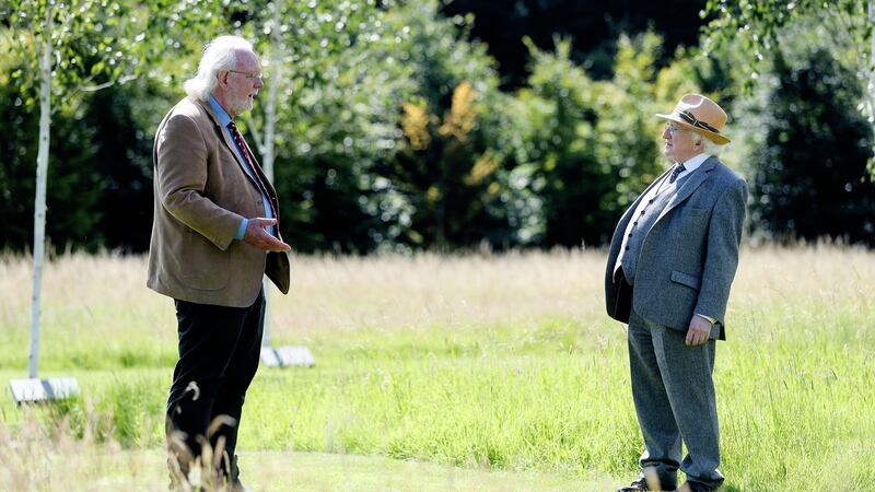 Neighbours: President  Michael D Higgins  meets  Leo Oosterweghel in the gardens at Áras an Uachtaráin in July. Photograph:  Maxwells