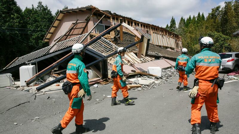 Rescue teams search for  missing people in Minamiaso, Kumamoto Prefecture, southwestern Japan on Sunday. Photograph: EPA