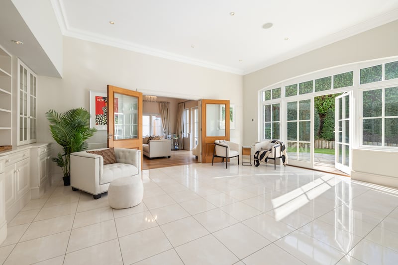 Part of the open plan kitchen, living and dining area, which opens to the rear garden