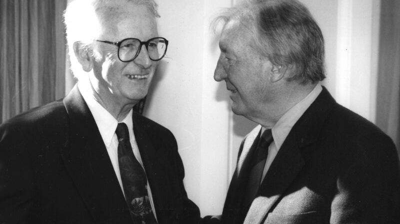 Pádraig Ó hUiginn, at his retirement presentation, in Government Buildings with Charlie Haughey, former taoiseach. Photograph: Joe St Leger