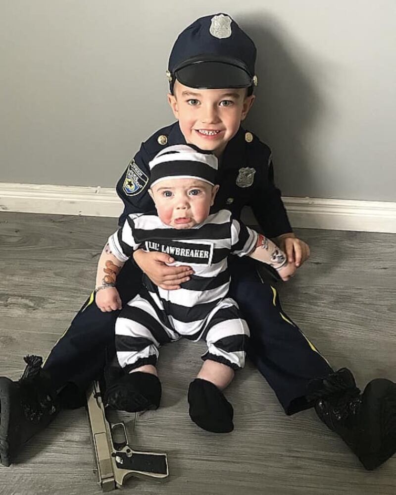 Kadyn (5 months) getting arrested by big brother Masyn (4) Photograph: Nicole Kee