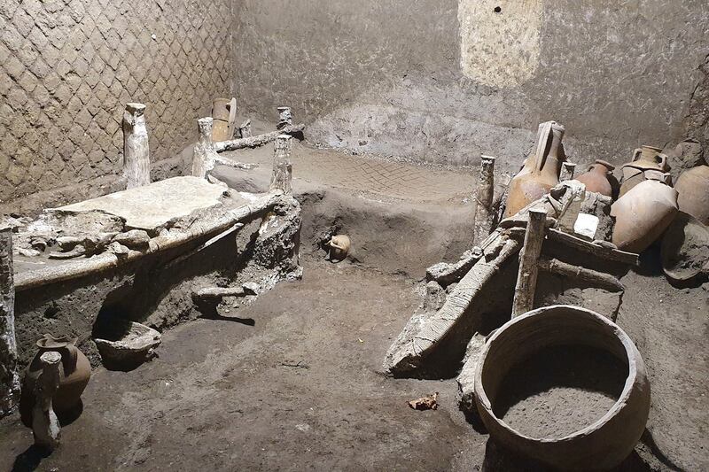The newly discovered room contains the remains of three beds made out of wood