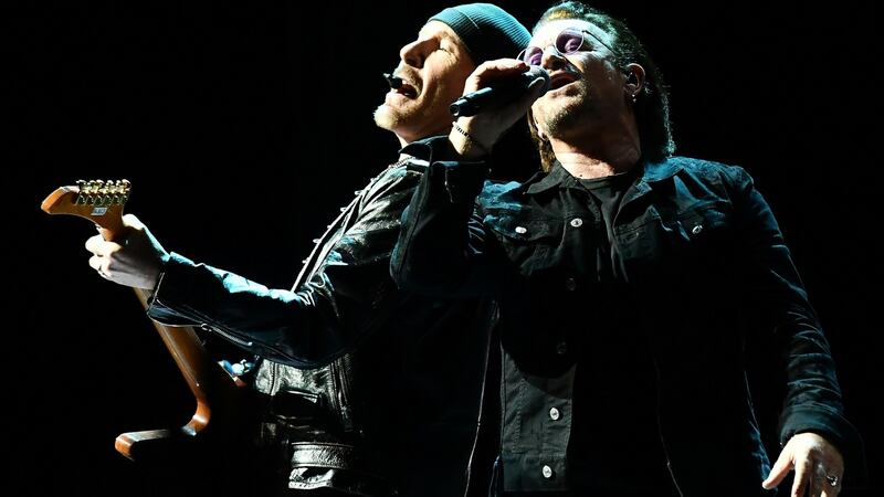 The Edge and Bono on stage in Belfast.   Photograph: Colm Lenaghan/Pacemaker