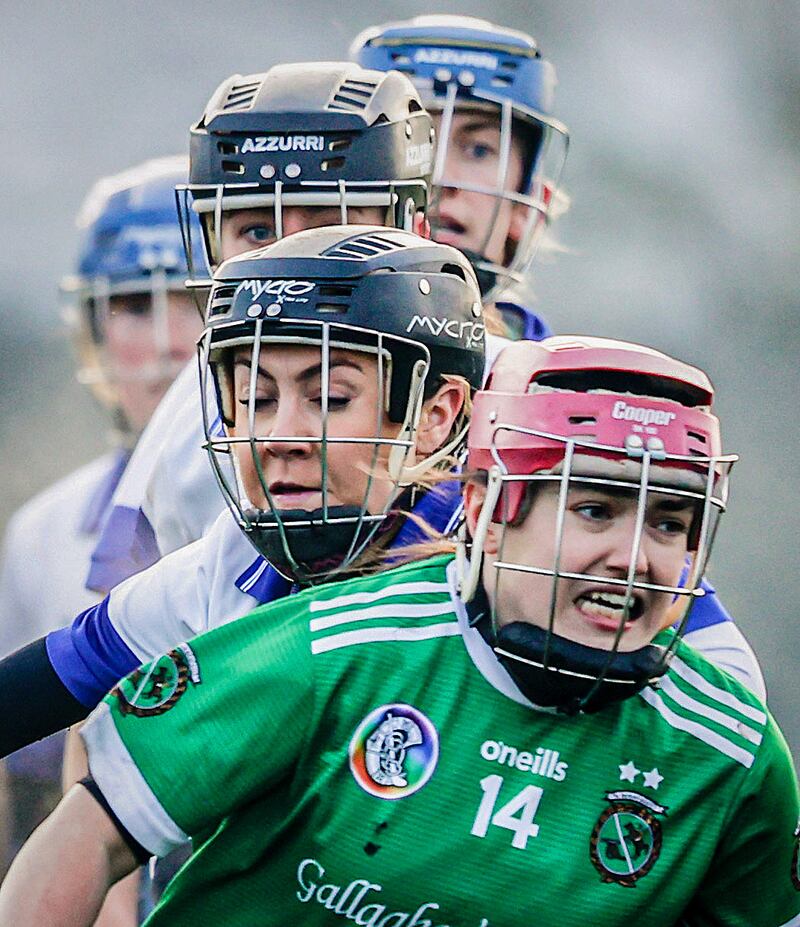 Sarsfields' Siobhán McGrath makes a break past Lora Smith, Danielle Smith, Muireann Kelleher and Ava Lambe of St Vincent's during the All-Ireland club semi-final at Birr. Photograph: Tom Maher/Inpho