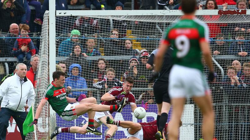 Galway’s Johnny Heaney stops a goal-bound shot from Mayo’s Diarmuid O’Connor in Championship semi-final at Pearse Stadium last year. Photograph: Cathal Noonan/Inpho