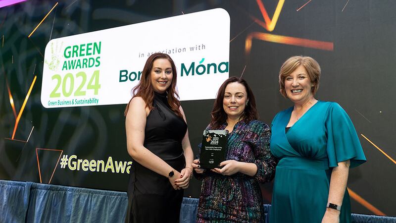 Kerri Morris, sustainability consultant at Cpl, presents the sustainability team of the year (1000+ Employees) award to Andrea Carroll and Miriam Ryan, DAA