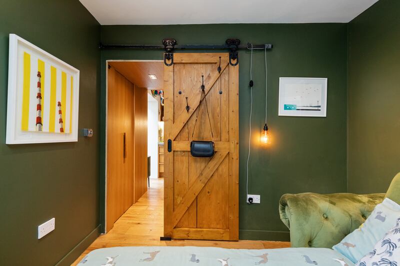 Bedroom one with sliding barn door