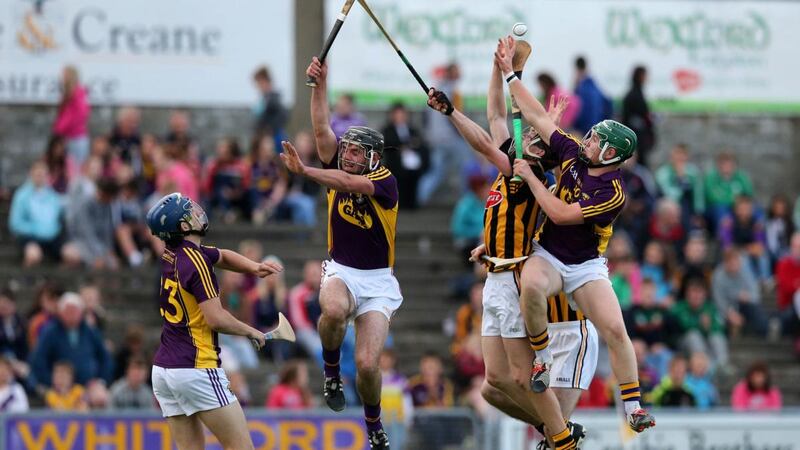 Wexford’s Tony French and Sam Kelly in action against  Enda Morrissey of Kilkenny during the Leinster under-21 hurling final at  Wexford Park in 2015. Photograph: Ryan Byrne/Inpho