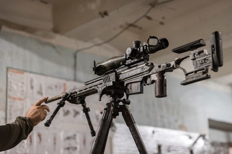 A sniper instructor teaches Ukrainian soldiers at an ad-hoc sniper school training volunteers fighting in eastern Ukraine. Photograph: David Guttenfelder/New York Times