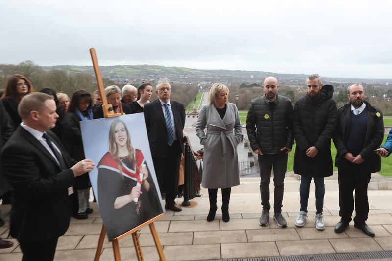 Sinn Fein vice president Michelle O'Neill with Natalie McNally's brothers (left to right) Declan, Niall and Brendan during a vigil for women who have died in violent circumstances outside the Parliament Buildings, Belfast, on Thursday, 5th December. Photograph: Liam McBurney/PA