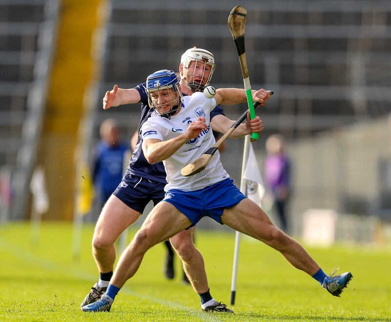 Paul Maher of Thurles Sarsfields is tackled by Kildangan’s Paul Flynn. Photograph: Ken Sutton/Inpho