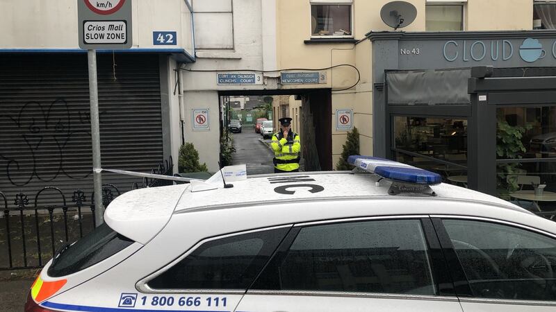 A garda at the scene of a fatal stabbing in north inner city Dublin. Photograph: Jack Power
