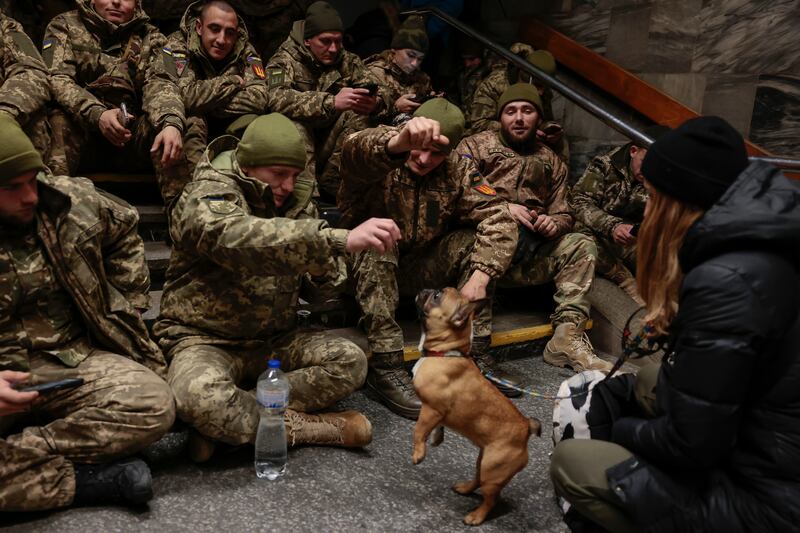 People shelter in the metro in Kyiv from Russian missile attacks, Ukrainian officials expect a new wave of Russian bombing this week, with previous rounds targeting critical infrastructure and causing massive water and power cuts, including in the capital Kyiv. Photograph: Jeff J Mitchell/Getty Images