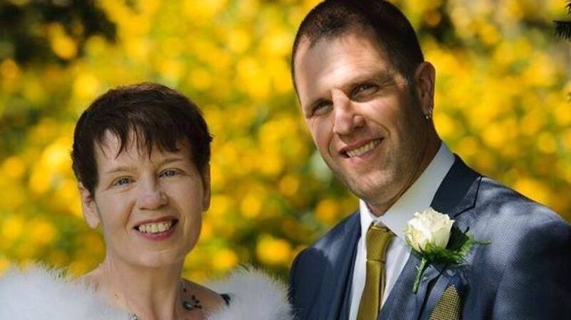 Joanne and Andrew on their wedding day. ‘In tribute to my Irish heritage, I wore a pale blue dress, in keeping with the custom, something old, something new, something borrowed, something blue’.