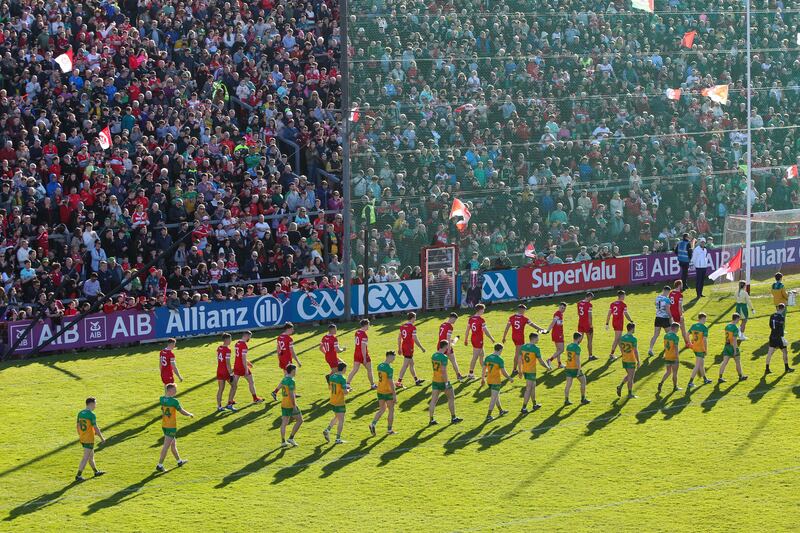 Derry and Donegal parade before a full house at Celtic Park in the Ulster SFC. Photograph: Lorcan Doherty/Inpho