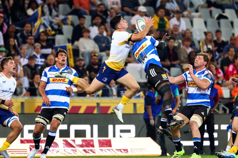 Jimmy O'Brien of Leinster catches the ball ahead of Seabelo Senatla of the Stormers. Photograph: EJ Langner/Inpho/Steve Haag Sports
