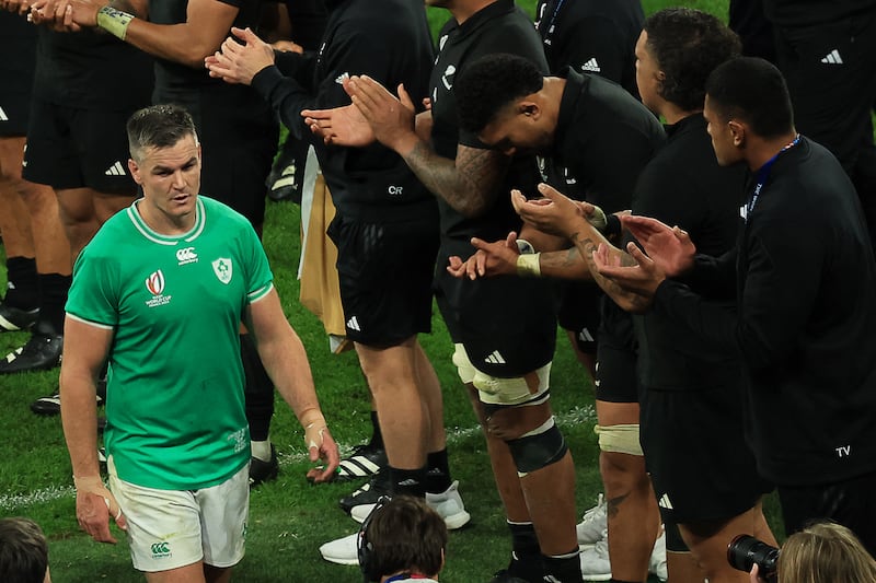 118 and out: New Zealand's players applaud Johnny Sexton off the pitch after his last appearance for his country. Photograph: Emmanuel Dunand/AFP via Getty Images