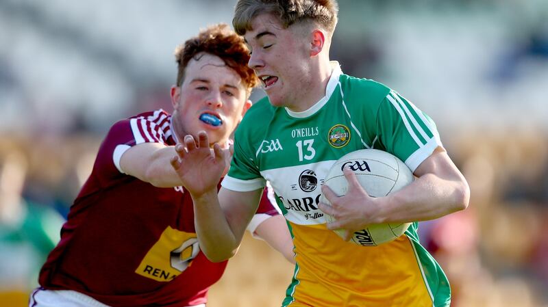 Westmeath’s Shane Murtagh challenges Jack Bryant of Offaly during the Electric Ireland Leinster MFC match at  O’Connor Park in  Tullamore. Photograph: James Crombie/Inpho