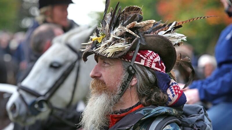 Feathers in his cap . . . a spectator at the Ballinasloe October Fair. Photograph: Joe O’Shaughnessy.