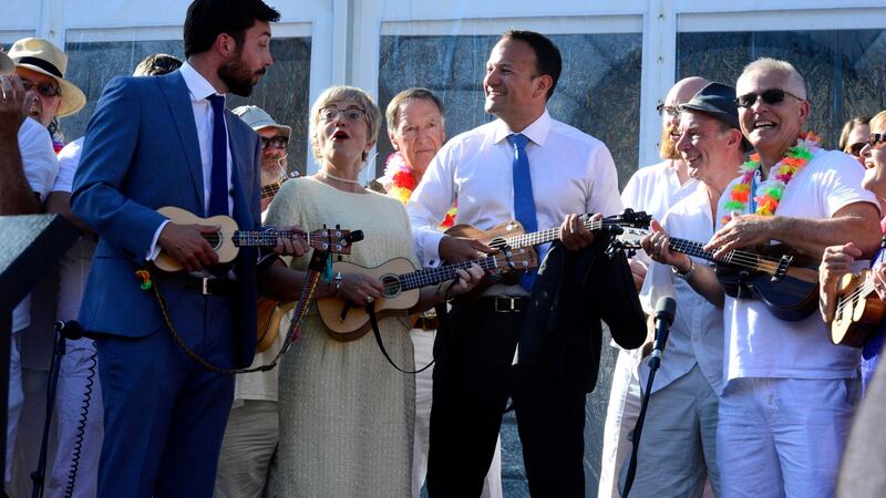 Taoiseach Leo Varadkar joining in the Dublin Ukulele Collective band with Minister for Housing Eoghan Murphy and Minister for Children Katherine Zappone in Dublin Castle. Photograph: Cyril Byrne