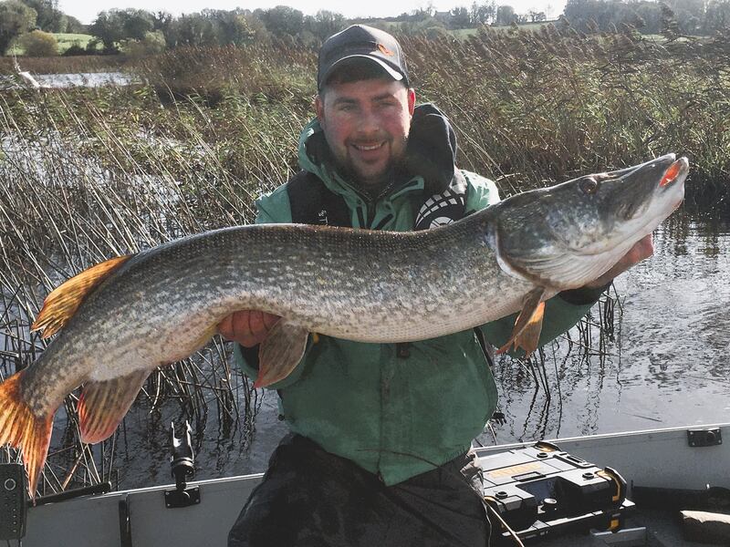 Damien Maguire, boat winner with his pike of 27lb 6oz also from the River Erne
