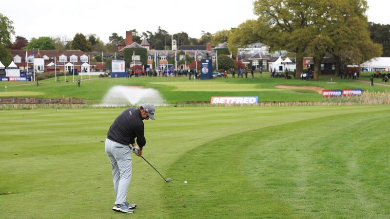 Bland plays his second shot on the 18th during the playoff. Photo: Andrew Redington/Getty Images