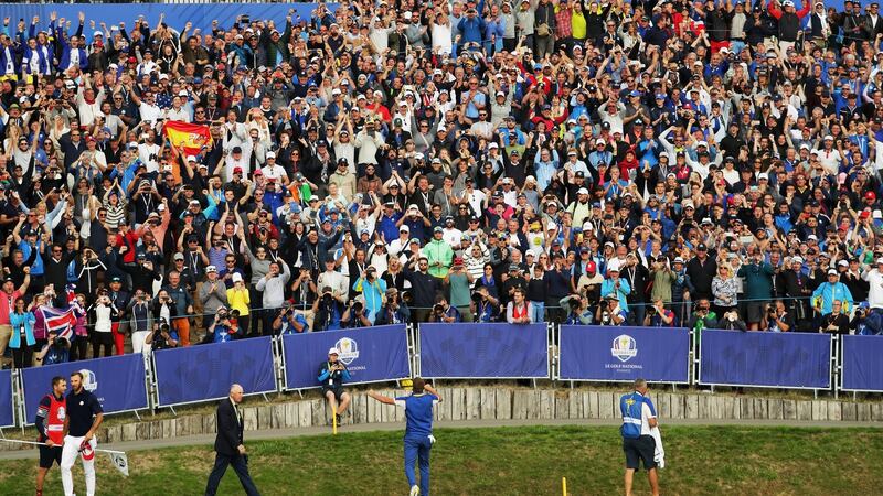 Ian Poulter celebrates winning his match on the 18th at the 2018 Ryder Cup at Le Golf National in Paris. Photo: Richard Heathcote/Getty Images