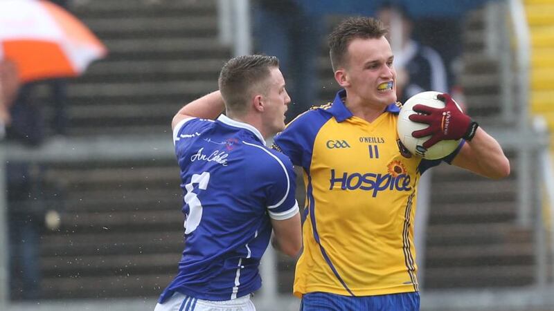 Enda Smith in action for Roscommon as he holds off Joshua Hayes of Cavan. The break from intercounty action has allowed him to sort out a pelvic injury. Photograph: Andrew Paton/Inpho