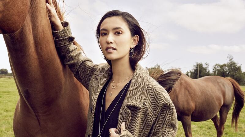 With jewellery by MoMuse, model wears Erne raglan tweed coat by Magee, €625, and Four Threads cotton Chore waistcoat €290. Photograph: Veronika Faustman