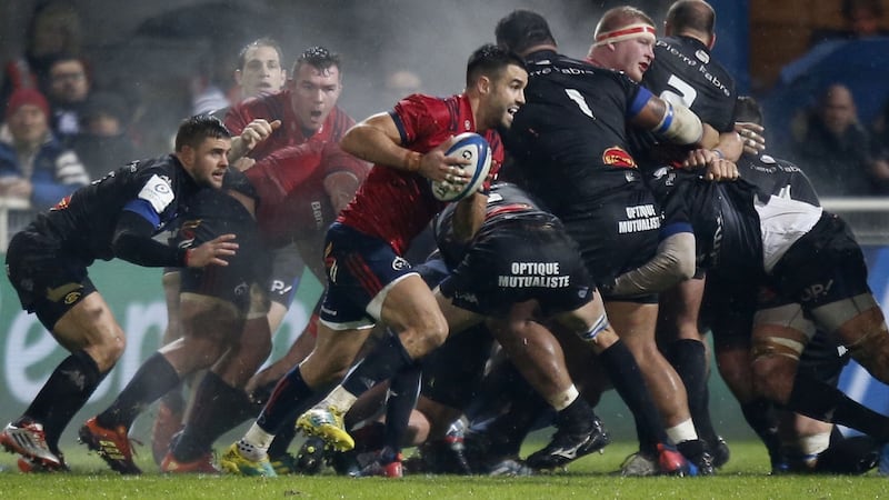 Munster scrumhalf Conor Murray runs with the ball during the Heineken Champions Cup pool one  match against  Castres at the Pierre Fabre stadium. Photograph: Raymond Roig/AFP/Getty Images