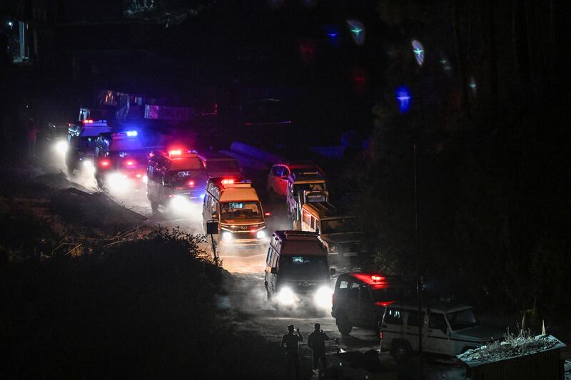 Ambulances carrying rescued workers leave after emergency teams safely brought out all trapped workers from the collapsed Silkyara tunnel. Photograph: Sajjad Hussain/AFP via Getty Images