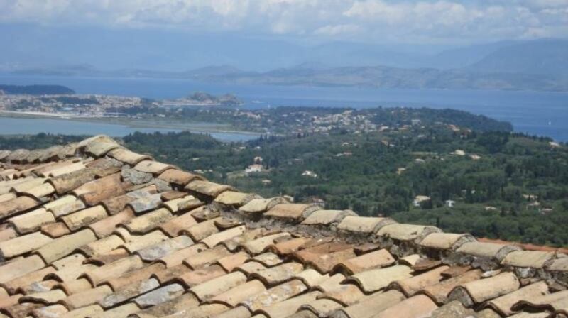 In Greece this 50sq m (538sq ft) stone house has views of the sea and mountains from its balcony