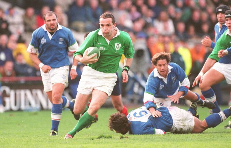 Conor O Shea breaks the Italian defence to score during a Six Nations match in Lansdowne Road. Photograph: Dara Mac Dónaill/The Irish Times