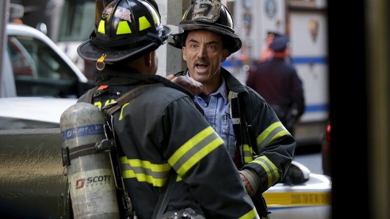 New York City firefighters work on the scene where a building undergoing demolition work partially collapsed. Photograph: Reuters
