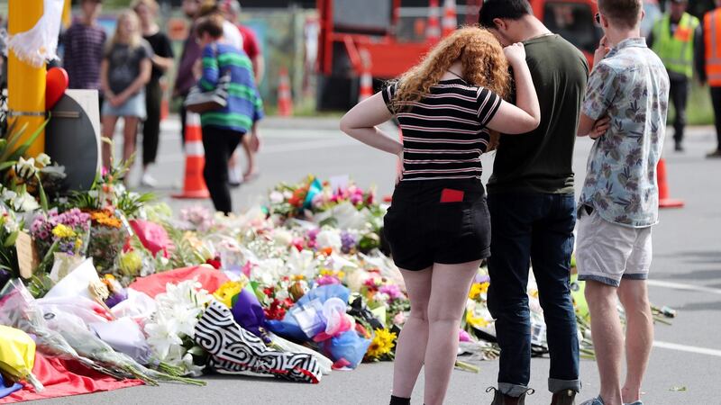 Residents pay their respects by placing flowers for the victims of the mosques attacks in Christchurch on March 16th, 2019. Photograph: Michael Bradley/AFP/Getty Images