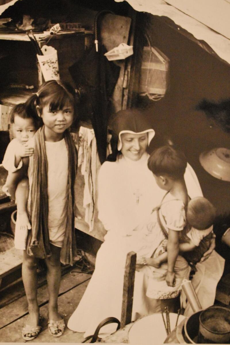 Dr Cathleen Monahan visiting a ‘boat family’, Hong Kong. Courtesy Missionary Sisters of St Columban.
