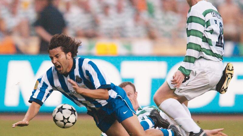Celtic’s Neil Lennon watches Joos Valgaeren go down during the 2003 Uefa Cup final. Photograph: Sandra Behne/Bongarts/Getty Images