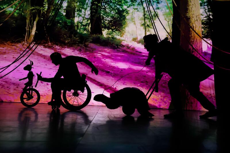 Florent Devlesaver (Hare) and Rob Heaslip (Tortoise) in The Race by Marc Brew, during Dublin Dance Festival 2023. Photograph: Alan Betson