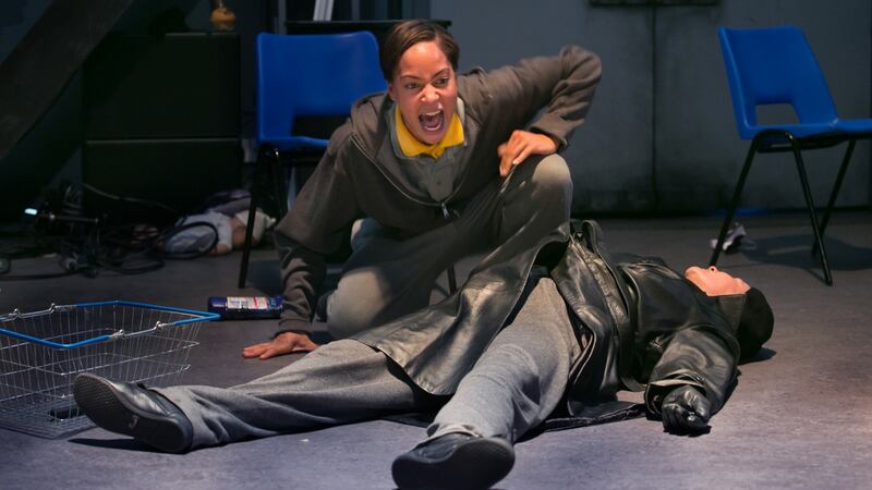 Cush Jumbo, as Mark Antony, crouches over Frances Barber, as Caesar, in a production from London’s Donmar Warehouse Theatre of Julius Caesar at St Ann’s Warehouse in New York. Photograph: Sara Krulwich/The New York Times