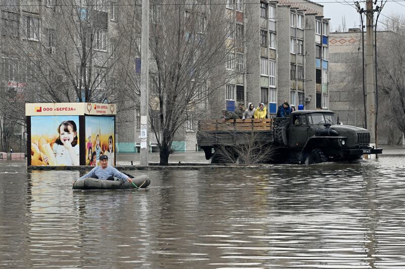 Rescuers evacuate residents from the flooded part of the city of Orsk on Monday. Photograph: Anatoliy Zhdanov/Kommersant Photo/AFP via Getty Images