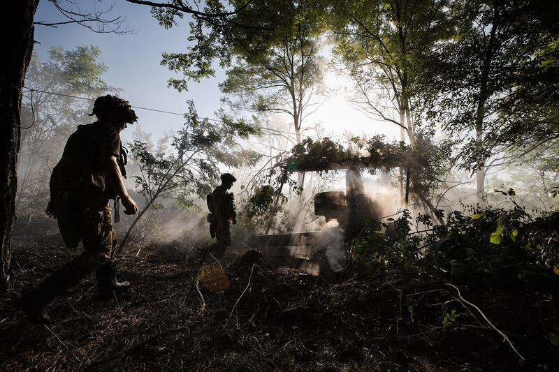 An artillery unit of the 95th Separate Air Assault Brigade fires a howitzer at Russian troops trying to capture the city of Toretsk, in the Donetsk region of eastern Ukraine on July 24th. Photograph: Tyler Hicks/The New York Times
                      